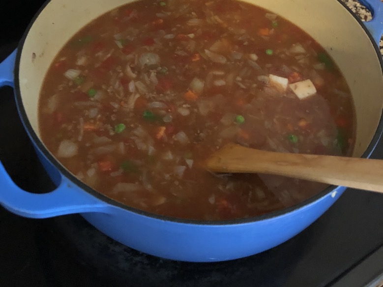 Simmering hamburger soup on stove

