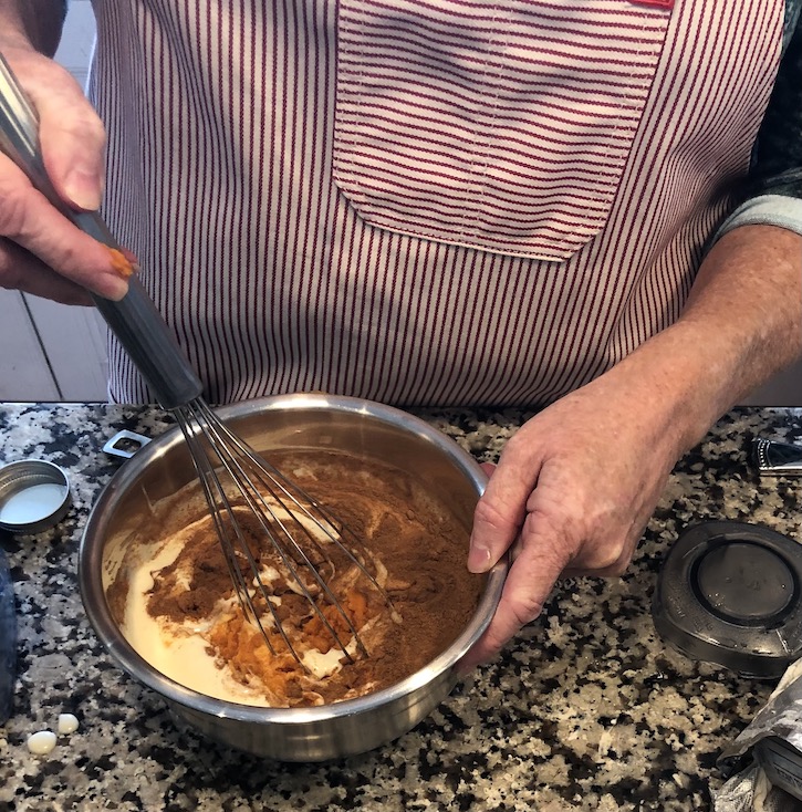 Mixing pumpkin spice filling and plain filling for cheesecake